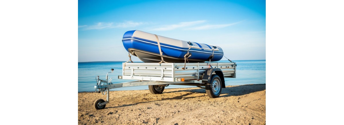 Бортовой прицеп для перевозки лодки ПВХ: возможности